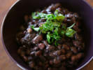 Couples Cooking Class - Vegetarian Tostada Bonanza for 2: black beans in a purple bowl