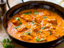 Cooking Class - Exploring Indian Cuisine: butter chicken in a black pan