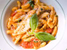 Team Building Cooking Class - Handmade Pasta Traditions in Las Vegas: cavatelli pasta in tomato sauce with basil garnish