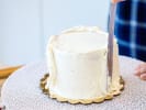 Cooking Class - Decorative Cake Designs: chef applying buttercream to cake