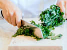 Online Cooking Class - A Focus on Cooking Techniques: chef chopping cilantro