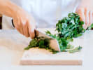 Cooking Class - Traditional Thai Cuisine in Downtown Chicago: chef chopping cilantro