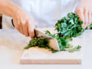 Cooking Class - Explore Latin Cuisine in Pittsburgh: chef chopping cilantro