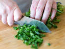 Online Cooking Class - Street Food From Barbados: chef chopping fresh parsley