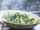 Cooking Class - Classic Southern Soul Food: chef cooking greens in a pan