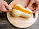 Online Cooking Class - Italian Seasonal Favorites: chef cutting a butternut squash