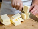 Online Cooking Class - Essential Seasonal Butter Boards: chef cutting butter