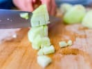 Cooking Class - Indian Cuisine Made Simple: chef dicing an apple