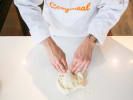 Cooking Class - Homemade Pizza With A Twist in Manhattan: chef kneeding pizza dough