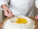 Online Cooking Class - Italian Seasonal Favorites: chef making pasta dough