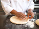 Cooking Class - Handmade Pizza Basics: chef making pizza from scratch