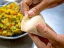 Cooking Class - Authentic Vegetarian Indian Flavors in Toronto: chef making samosas