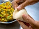 Cooking Class - Vegetarian Indian Fare: chef making samosas