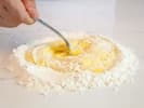 Online Cooking Class - Handmade Pappardelle Pasta: chef mixing flour and eggs