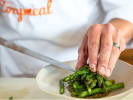 Cooking Class - Celebratory Spring Brunch in Manhattan: chef plating asparagus and green beans in a plate