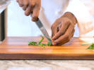 Online Italian Cooking Class - Intro to Vegan Comfort Cooking: chef preparing basil for pesto