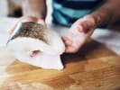 Cooking Class - A Pescatarian Taste of the Mediterranean: chef preseting raw white fish