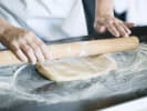 Cooking Class - Elevated S'mores and Stories: chef rolling out cookie dough