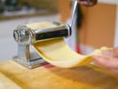 Team Building Cooking Class - Pasta Prepared From Scratch in Manhattan: chef rolling out pasta dough