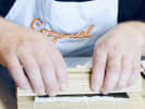 Cooking Class - Essential Vegan Sushi in Manhattan: chef rolling sushi rolls