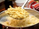Team Building Cooking Class - Classic European Menu in Denver: chef scooping spaetzle