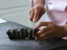 Cooking Class - Handmade Sushi Rolls: chef shahida slicing sushi rolls