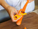 Team Building Cooking Class - Gourmet Asian Fusion Fare in Manhattan: chef shredding a carrot
