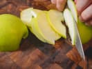 Cooking Class - A Workshop All About Pie in Brooklyn: chef slicing a granny smith apple