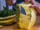 Online Cooking Class - Classic Hawaiian Recipes: chef slicing a pineapple