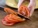Cooking Class - Plant-Based Mexican Food in Brooklyn: chef slicing a tomato