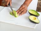 Cooking Class - Vegan Classics: chef slicing avocado