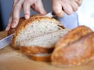 Cooking Class - Impressive Gourmet Appetizers in Manhattan: chef slicing bread for crostini