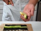 Cooking Class - Hand-Rolled Sushi and More: chef slicing fresh avocado