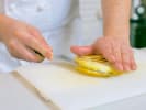 Cooking Class - Latin American Brunch in Washington, D.C.: chef slicing fresh baked arepa