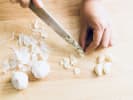 Cooking Class - A Taste of Anglo-Indian Fare in Northern Suburbs: chef slicing fresh garlic