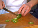 Cooking Class - Essential Tex-Mex Fare: chef slicing fresh jalapenos for a jalapeno coleslaw