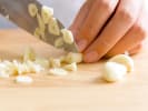 Cooking Class - Spicy Asian Fare: chef slicing garlic