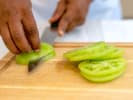 Cooking Class - Decadent Southern Classics: chef slicing green tomatoes