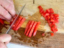 Cooking Class - Seasonal Local Market Fare in Downtown Dallas: chef slicing local tomatoes