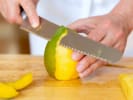Cooking Class - Cook a Five-Course Thai Feast From Scratch in Toronto: chef slicing mango