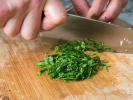Online Cooking Class - Handmade Gourmet Spices and Condiments: chef slicing parsley