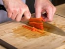 Online Cooking Class - Classic Thai Green Curry: chef slicing red peppers