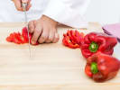 Cooking Class - Southern Comfort Food Favorites: chef slicing roasted red peppers