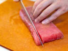 Cooking Class - Nigiri for Beginners in Boston: chef slicing tuna