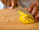 Cooking Class - Soul Food Favorites: chef slicing yellow bell pepper