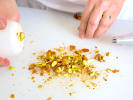 Cooking Class - Mediterranean Coastal Fare: chef smashing pistachios