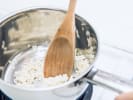 Team Building Cooking Class - Elegant Italian Dishes in Manhattan: chef stirring rice for risotto
