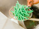 Cooking Class - Upscale New American Fare: chef washing green beans