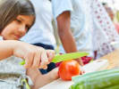 Cooking Class - Allergy-Friendly Italian Cooking - Kids' Edition in Boston Proper: child cutting tomato