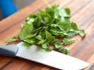 Cooking Class - Hearty Homemade Brunch Favorites in Downtown Dallas: chopped spinach with knife